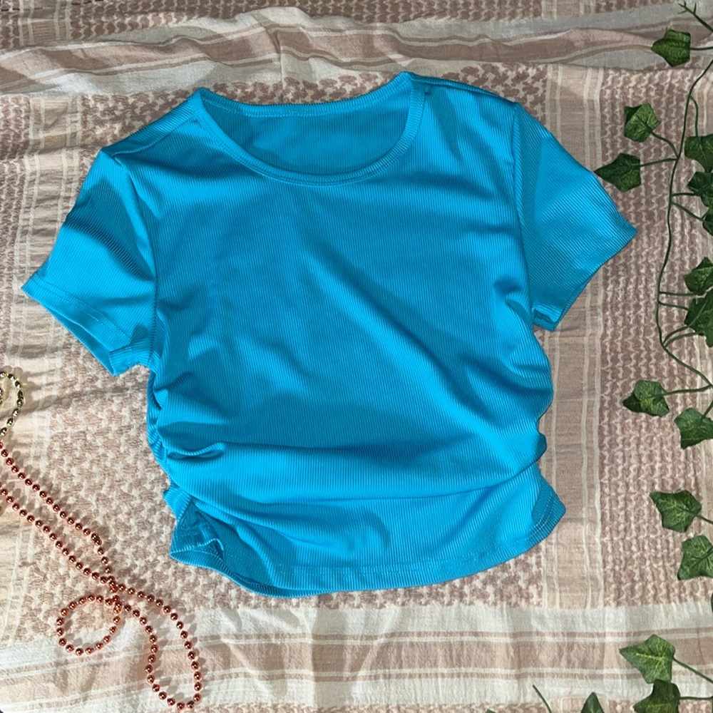 Blue cropped workout shirt